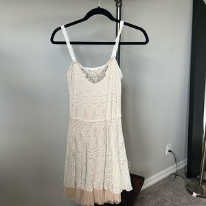 Lace free people swing dress with bead detail. Excellent used condition